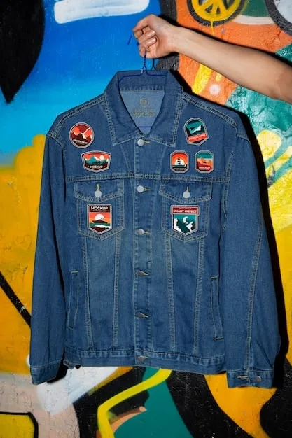 A close-up shot of a person wearing a customized denim jacket with hand-painted designs and patches, highlighting the DIY aspect of underground fashion.