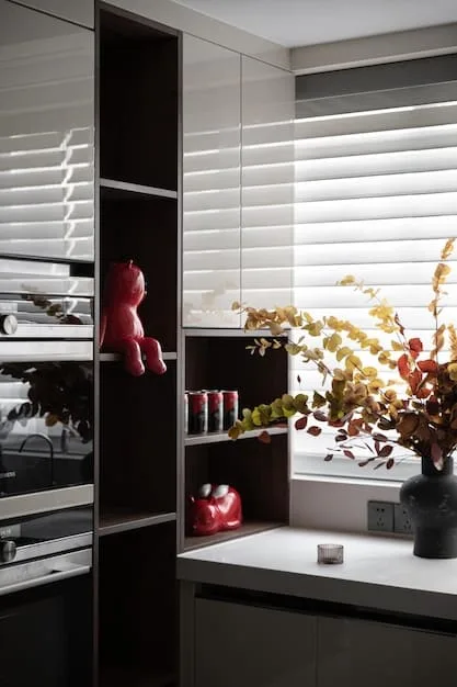 Interior of a meticulously organized and aesthetically pleasing van, showcasing minimalist decor, a small kitchen area, and storage solutions. Natural light streams in through the windows.