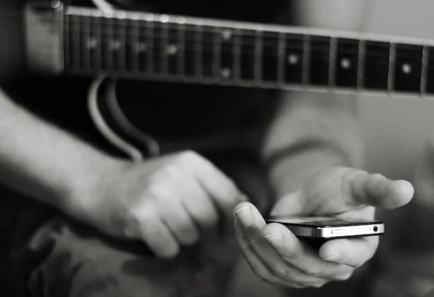 A close-up shot of an emerging musician's hands playing a guitar with social media icons subtly overlaid, symbolizing the integration of music and social media marketing.