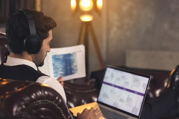 A young musician sitting at a laptop, analyzing royalty statements with a look of concentration. The screen displays a dashboard with charts showing royalty earnings.