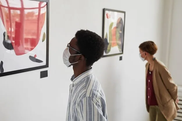 A diverse group of artists installing artwork in a non-traditional exhibition space, such as a warehouse or community center. The image showcases the DIY aesthetic, with exposed brick and industrial elements. The artists are collaboratively hanging paintings, sculptures, and mixed-media pieces, emphasizing the collective's hands-on approach.