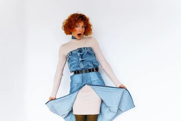 A fashion blogger showcasing a deconstructed denim skirt with layered panels and raw edges. The skirt is styled with a simple white t-shirt and chunky sneakers, highlighting its versatility and edgy vibe.