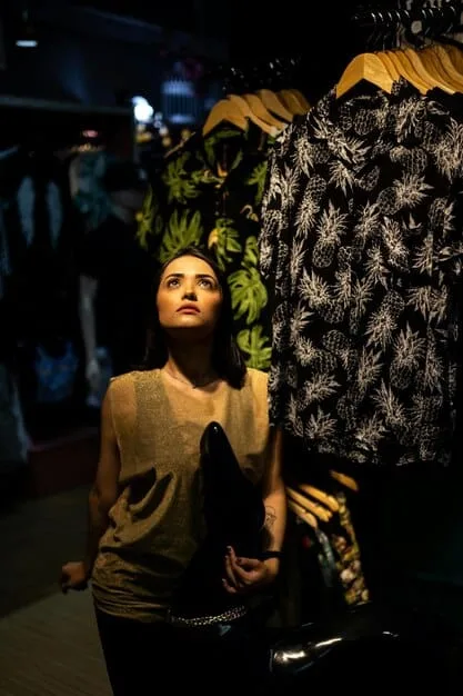 A designer showcasing a Piñatex jacket or dress during an underground fashion show, highlighting the fabric's unique woven texture and its vibrant, dyed color. Capture the garment in motion to emphasize its drape and wearability.