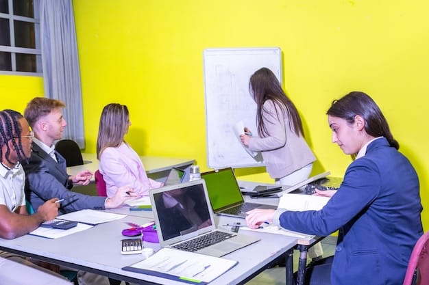Students at Acton Academy collaborating on a business plan, surrounded by laptops and whiteboards filled with ideas, showing the entrepreneurial spirit of the school.