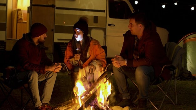 A group of diverse van dwellers gathered around a campfire in a national forest, laughing and sharing stories. Several vans are parked nearby, forming a small, temporary village.