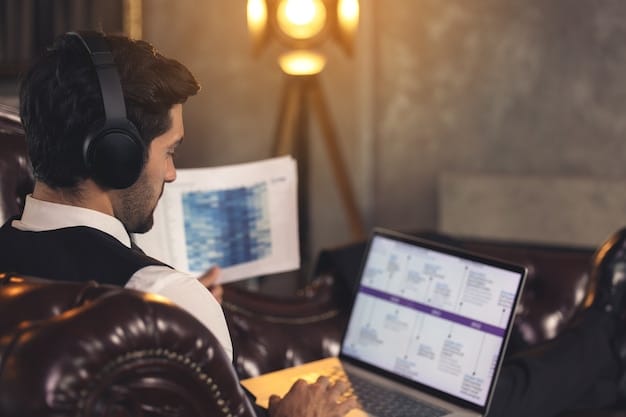 A young musician sitting at a laptop, analyzing royalty statements with a look of concentration. The screen displays a dashboard with charts showing royalty earnings.