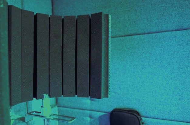 A well-organized home studio setup for virtual concerts, featuring a high-quality microphone, webcam, acoustic panels, and a computer monitor displaying streaming software with various audio and video settings, showcasing the technical preparation behind a successful online performance.