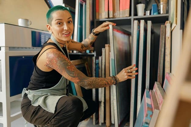 An artist inspecting a batch of newly printed art prints in a local print shop. The prints are vibrant and high-quality, reflecting the artist's meticulous attention to detail.