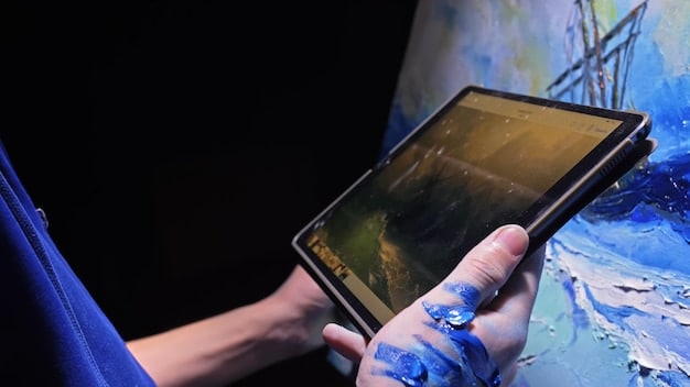 A close-up of an artist's hands meticulously arranging digital art pieces on an online portfolio website. The screen displays a modern and clean layout with high-resolution images of various artworks.