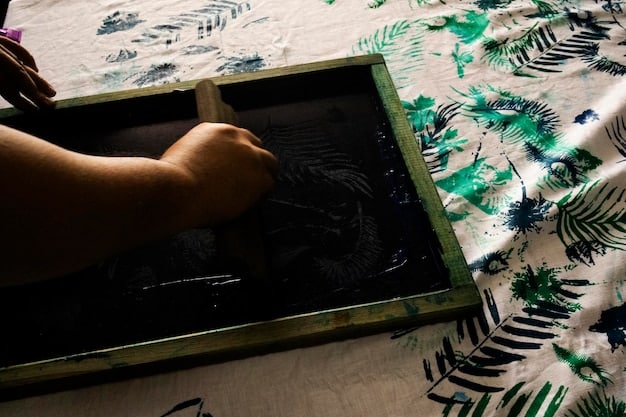 A close-up shot of hands crafting a decorative backdrop for a music video. The backdrop is made of colorful paper flowers, fairy lights, and fabric scraps. The hands are carefully arranging the elements, showcasing attention to detail and creativity.