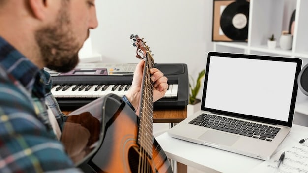 A musician sitting at a laptop, carefully designing an electronic press kit (EPK). The laptop screen displays various elements of the press kit, including a biography, high-quality photos, and links to music samples. The room is well-lit and organized, with instruments and music equipment visible in the background.