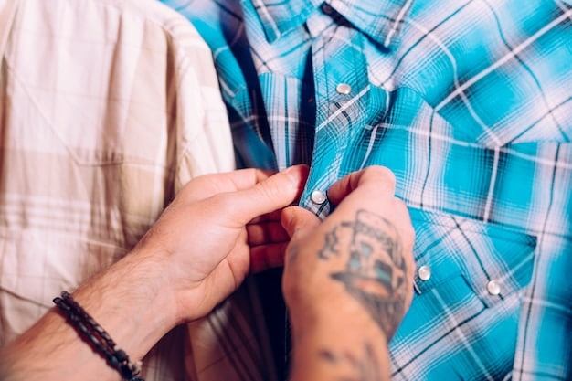 A person carefully examining the label and stitching of a vintage band t-shirt, highlighting the details that indicate its authenticity. The photo emphasizes the importance of close inspection when buying vintage online.