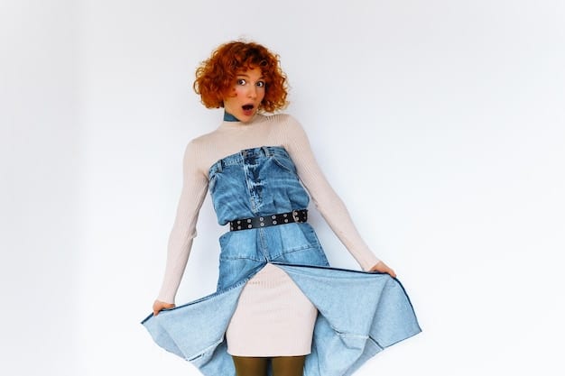 A fashion blogger showcasing a deconstructed denim skirt with layered panels and raw edges. The skirt is styled with a simple white t-shirt and chunky sneakers, highlighting its versatility and edgy vibe.