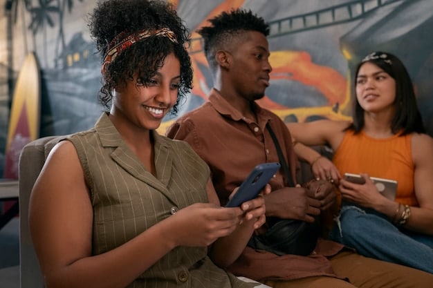 A diverse group of young adults intently focused on their smartphones and portable gaming devices, perhaps playing a collaborative augmented reality game in an urban park, illustrating mobile and AR alternative gaming.