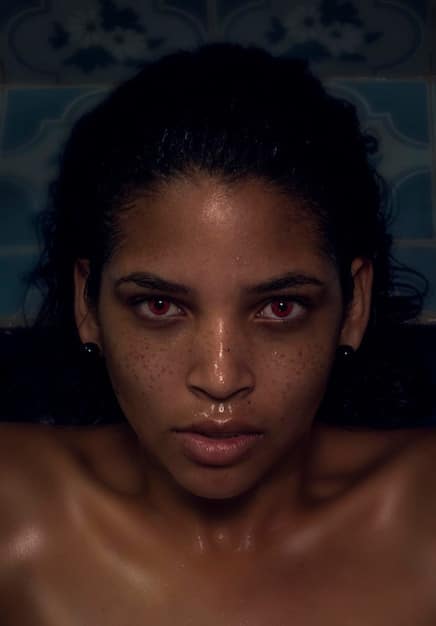 A close-up, highly detailed shot of a distressed, dark-textured character model from a modern indie game, emphasizing facial expressions of despair or grim determination, set against a blurred, atmospheric background of a desolate future city.