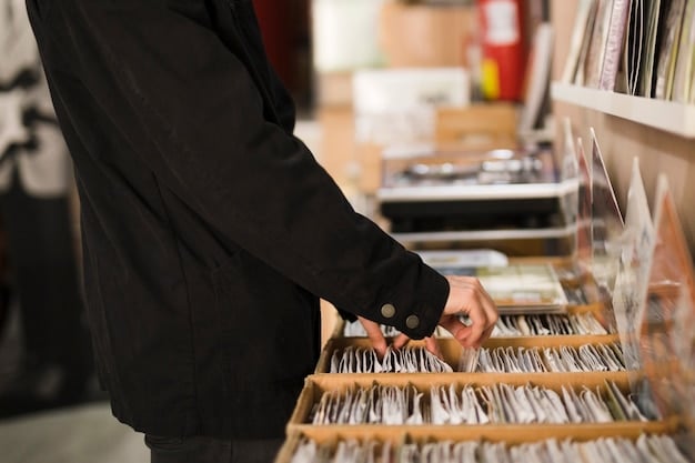 Close-up of a hand examining a rare vinyl record inside an independent record store, with shelves of unique albums blurred in the background, conveying a sense of discovery and connoisseurship in a subculture-specific setting.
