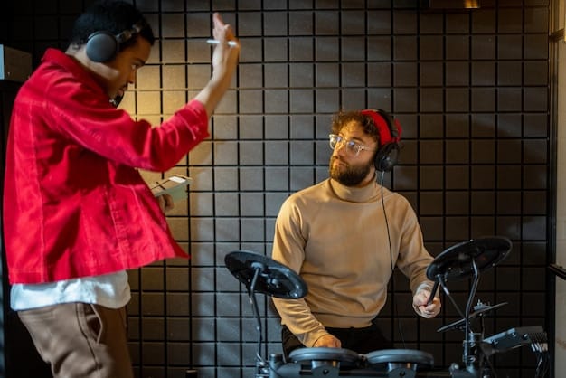 Two musicians from different genres collaborating in a recording studio, exchanging ideas and demonstrating creative synergy. Warm, inviting lighting.