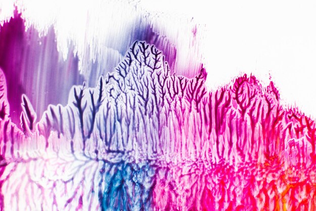 A vibrant digital illustration demonstrating various brush types and textures, with layers showing different stages of a fashion design focusing on exaggerated forms and bold colors.
