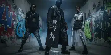 Models showcasing avant-garde streetwear from an underground fashion collaboration against an urban backdrop.